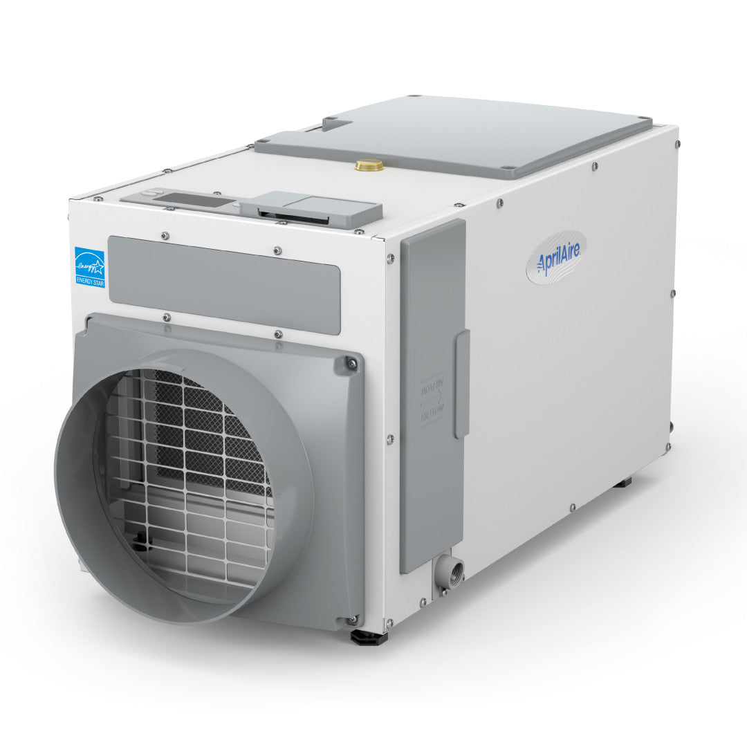White AprilAire E100 fixed dehumidifier cabinet with a circular duct opening, side access panel, front grille and drain connection.