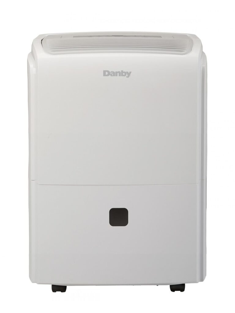 Front view of the compact white Danby DDR030EBWDB cabinet with a broad upper air outlet, small dark lower-front detail and casters.