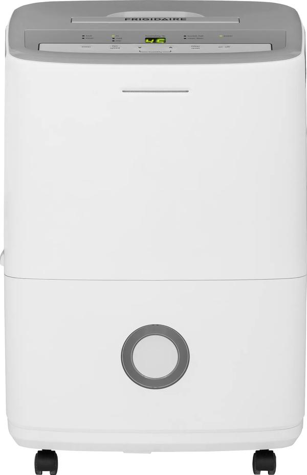 Front view of the white Frigidaire FFAD3033R1 dehumidifier with top controls and a circular bucket window.