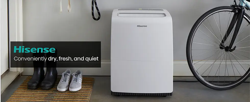 Wide lifestyle view of a white Hisense DH6024KP1WG-associated dehumidifier cabinet beside household items; no pump hardware, model plate or control details are visible.