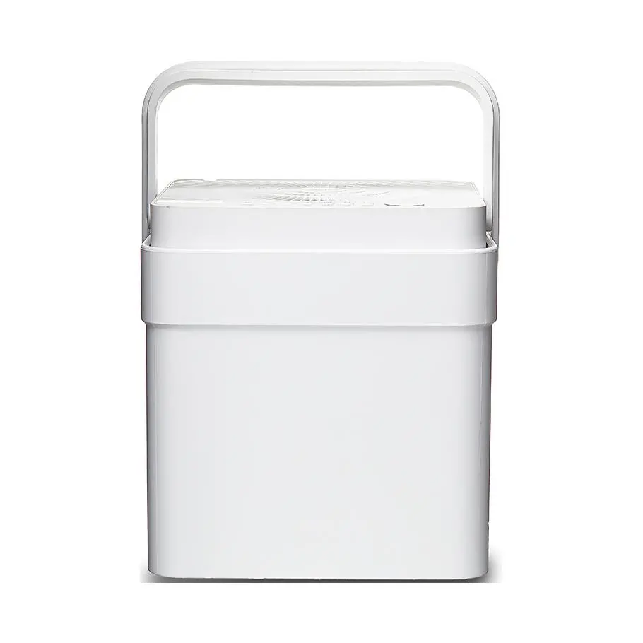 Midea MAD35S1QWT white Cube dehumidifier in the raised-handle position.