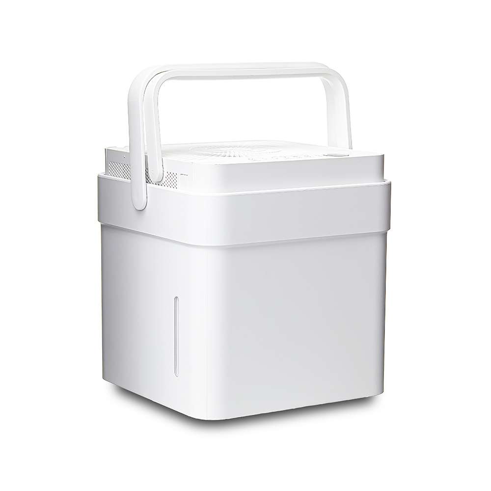 White Midea MAD50S1QWT Cube dehumidifier with raised handle and nested bucket.