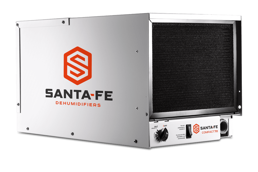 Santa Fe Compact70 low horizontal dehumidifier cabinet with its dark filter grille, side logo and local control panel.